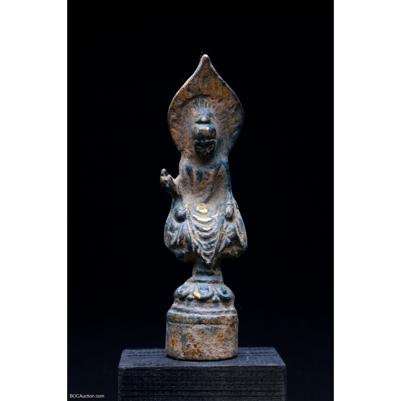 A very rare bronze votive seated Buddha stele from the Northern Wei Dynasty