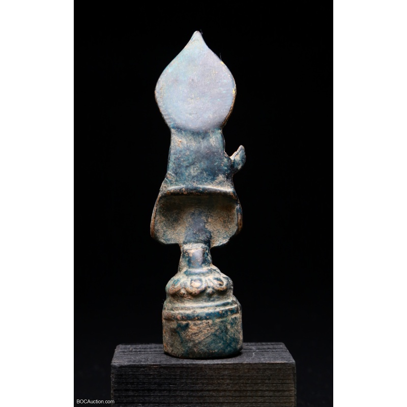 A very rare bronze votive seated Buddha stele from the Northern Wei Dynasty