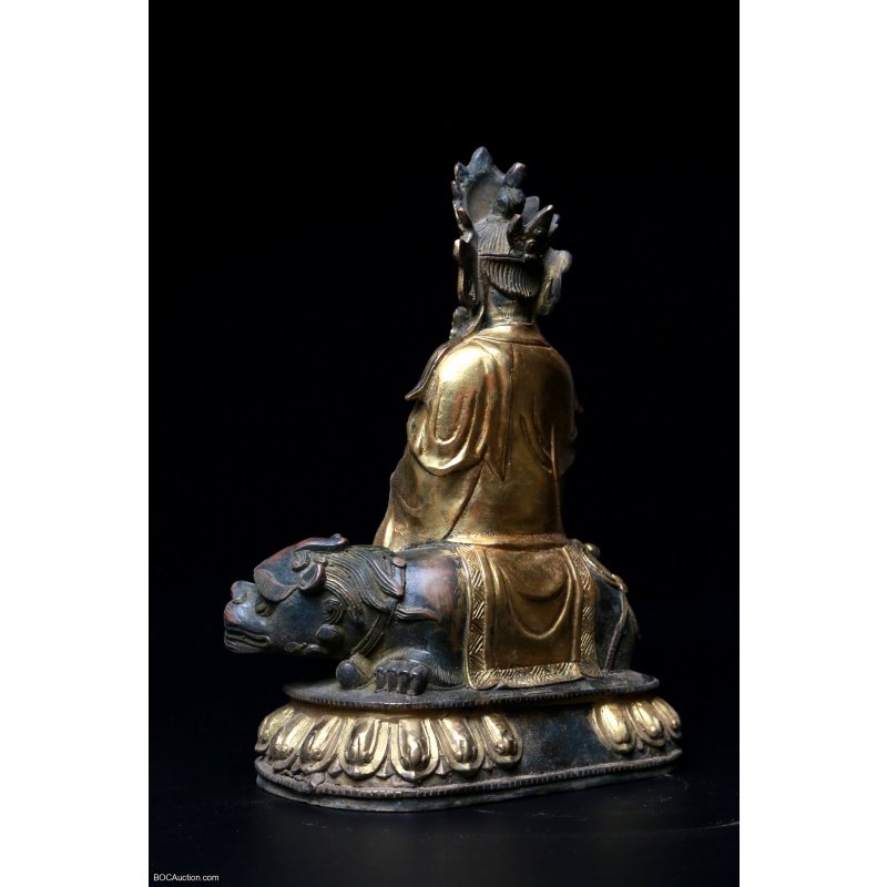 Gilt Lacquered Bronze Figure of Guanyin on Lion