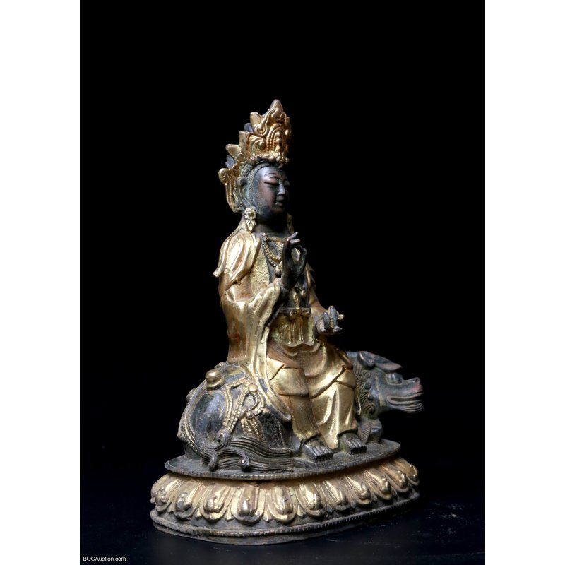Gilt Lacquered Bronze Figure of Guanyin on Lion